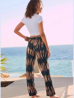 Pantalon large à ceinture élastique avec poches latérales