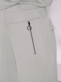 Pantalon large en modal avec poches zippées et taille élastique