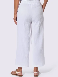 Pantalon large en mousseline avec taille haute et poches