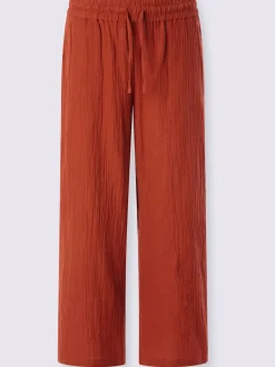 Pantalon large en mousseline avec taille haute et poches