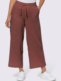 Pantalon large en mousseline avec taille haute et poches