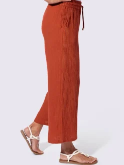 Pantalon large en mousseline avec taille haute et poches