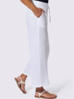 Pantalon large en mousseline avec taille haute et poches