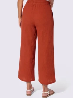 Pantalon large en mousseline avec taille haute et poches