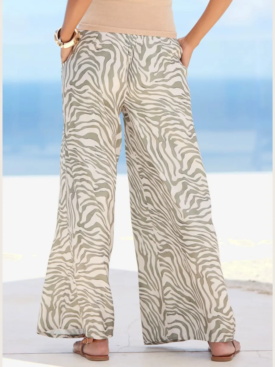 Pantalon large en satin à motif zébré avec ceinture smockée