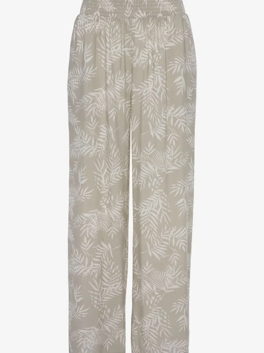 Pantalon large en viscose crêpée avec ceinture smockée et poches latérales