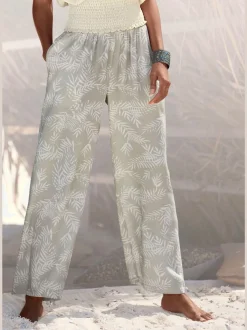 Pantalon large en viscose crêpée avec ceinture smockée et poches latérales