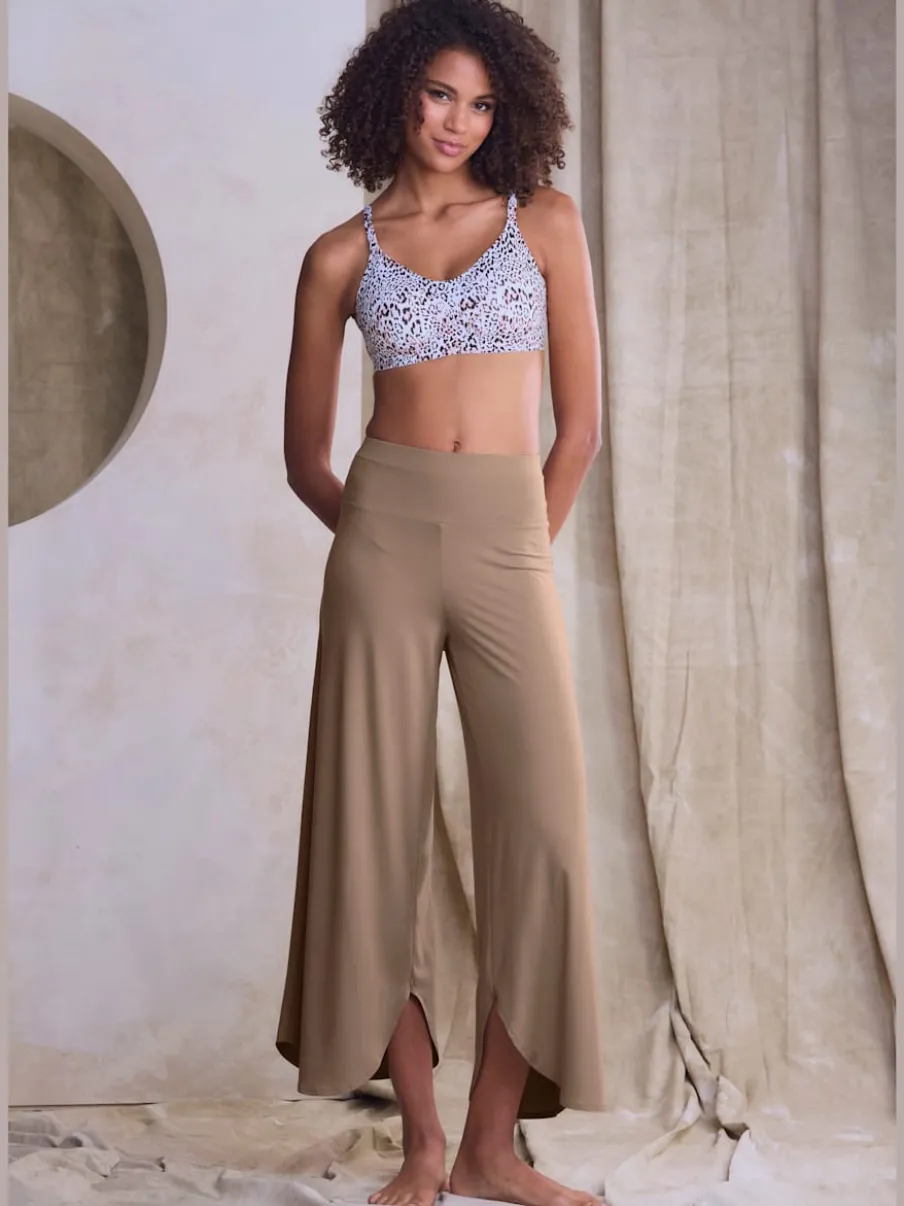 Pantalon large jupe-culotte doux avec ourlet arrondi