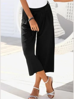 Pantalon large jupe-culotte rayé avec ceinture à nouer