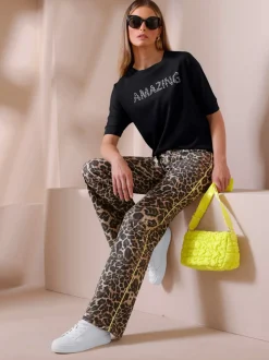 Pantalon large motif léopard avec passepoils contrastés