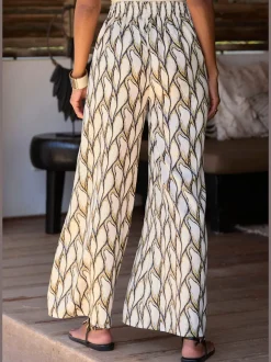 Pantalon large à motifs avec ceinture smockée et poches latérales