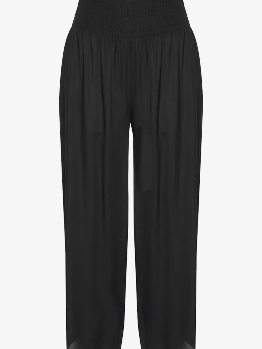 Pantalon léger à large ceinture avec fentes arrondies