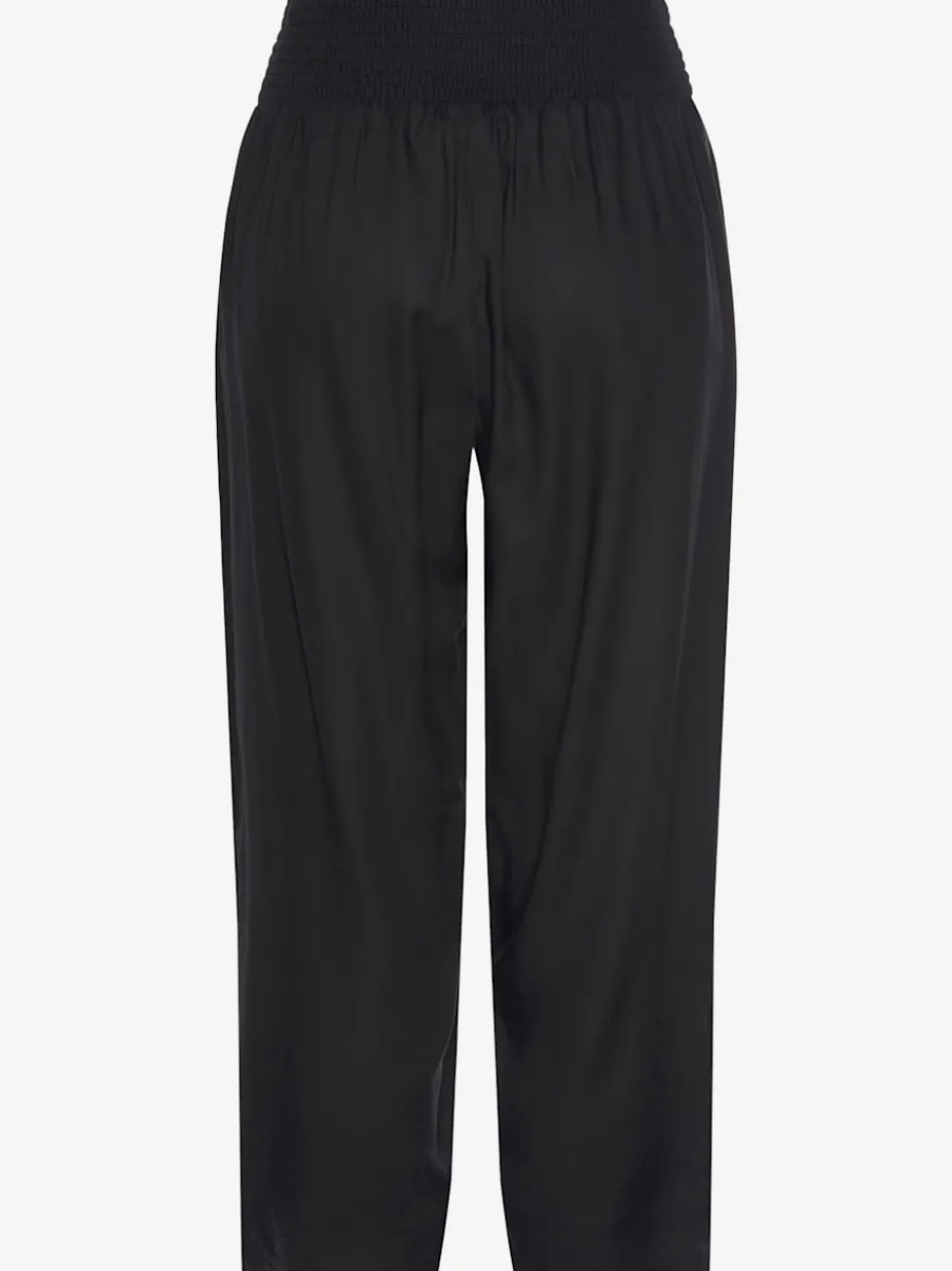 Pantalon léger à large ceinture avec fentes arrondies