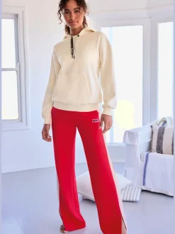 Pantalon lounge sportif avec rayures et poches latérales