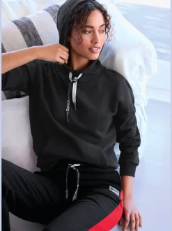 Pantalon lounge sportif avec rayures et poches latérales