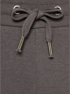 Pantalon molletonné à jambes larges avec poches latérales et coulisse