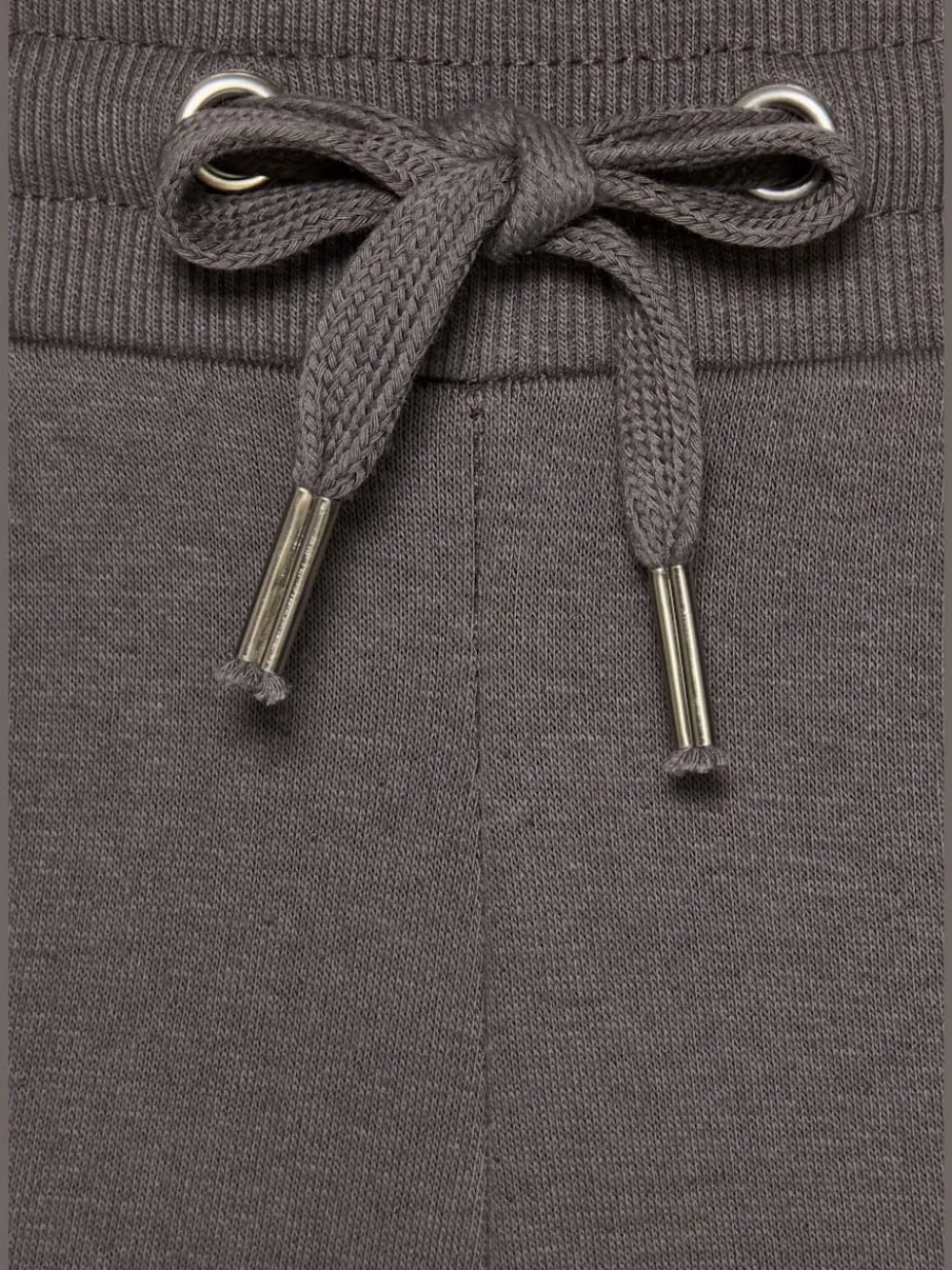 Pantalon molletonné à jambes larges avec poches latérales et coulisse