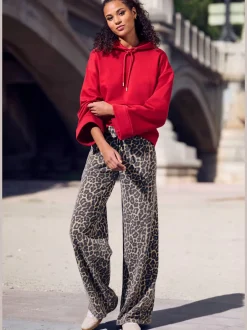 Pantalon molletonné pantalon détente large à l'imprimé léopard intégral