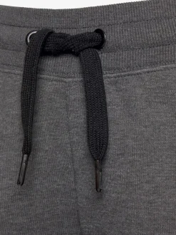 Pantalon molletonné sportif à rayures latérales et poches fendues