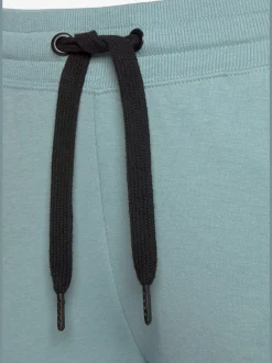 Pantalon molletonné sportif à rayures latérales et poches fendues