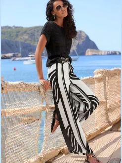 Pantalon palazzo estival avec imprimé intégral et poches latérales