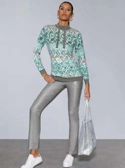 Pantalon 5 poches en matière brillante avec passants et rivets
