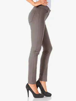Pantalons ajustés à effet ventre plat avec poches