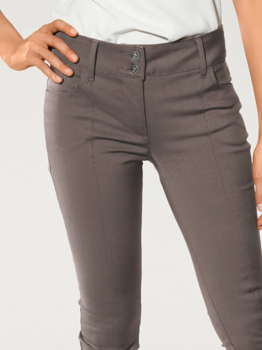 Pantalons ajustés à effet ventre plat avec poches