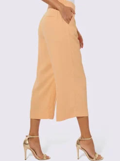 Pantalons avec ceinture gainante et poches latérales