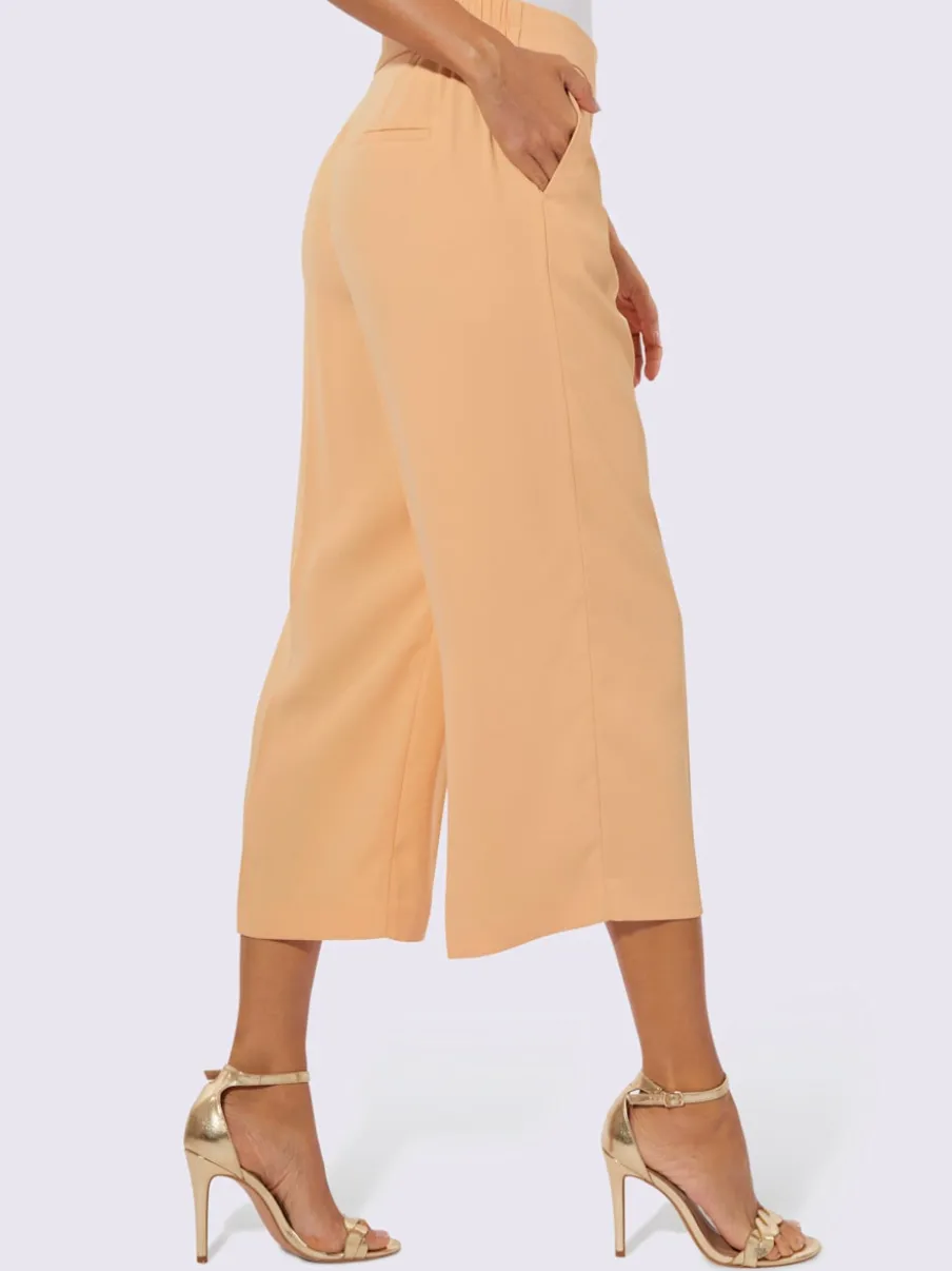 Pantalons avec ceinture gainante et poches latérales