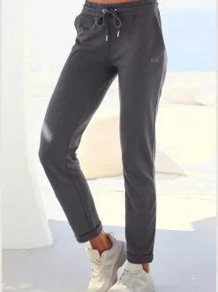 Pantalons confortables avec poches et logo brodé