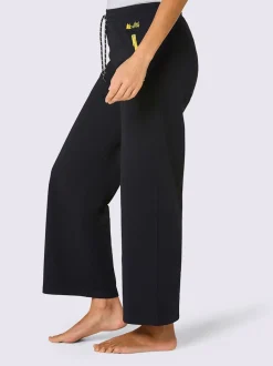 Pantalons confortables en matière sweat avec poches zippées