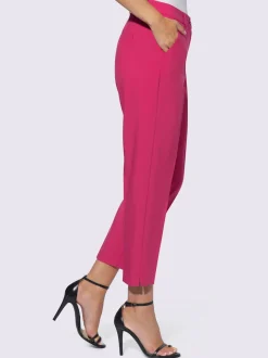 Pantalons coupe 7/8 avec poches et fente décorative