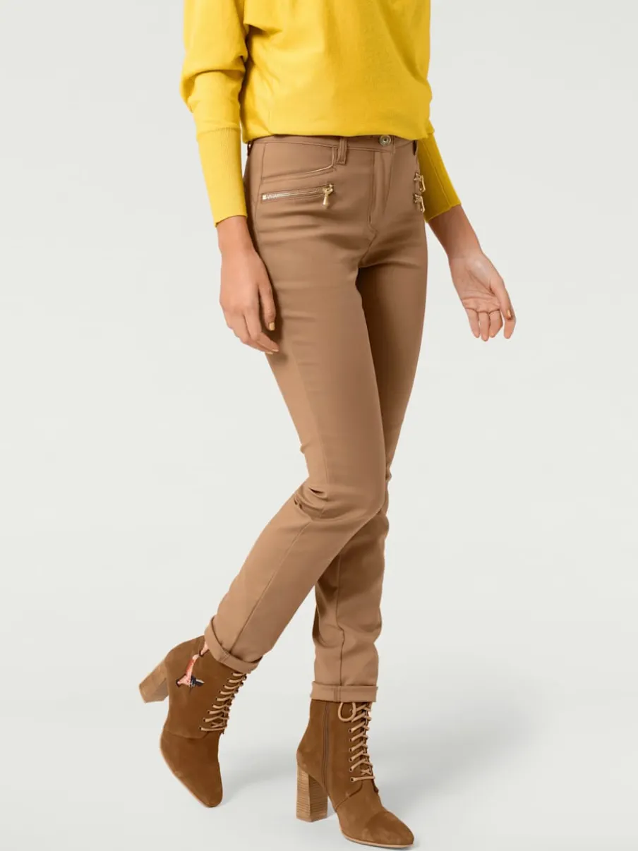 Pantalons extensibles avec coutures push-up et poches intégrées