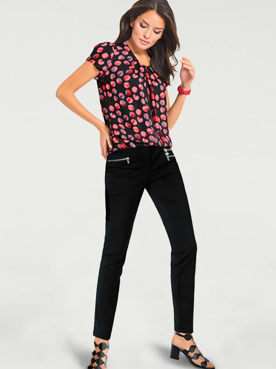 Pantalons extensibles avec coutures push-up et poches intégrées