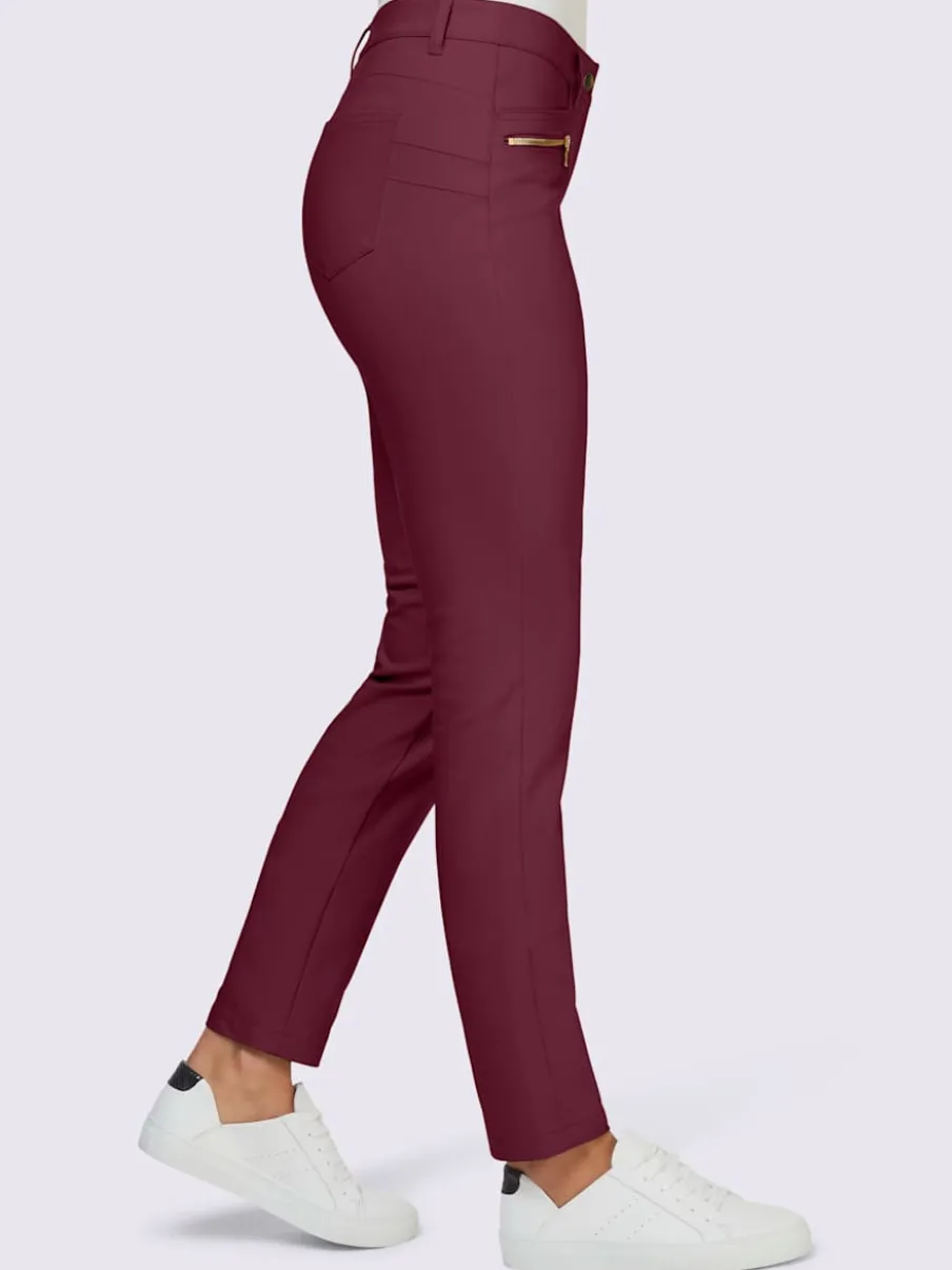 Pantalons extensibles avec coutures push-up et poches intégrées