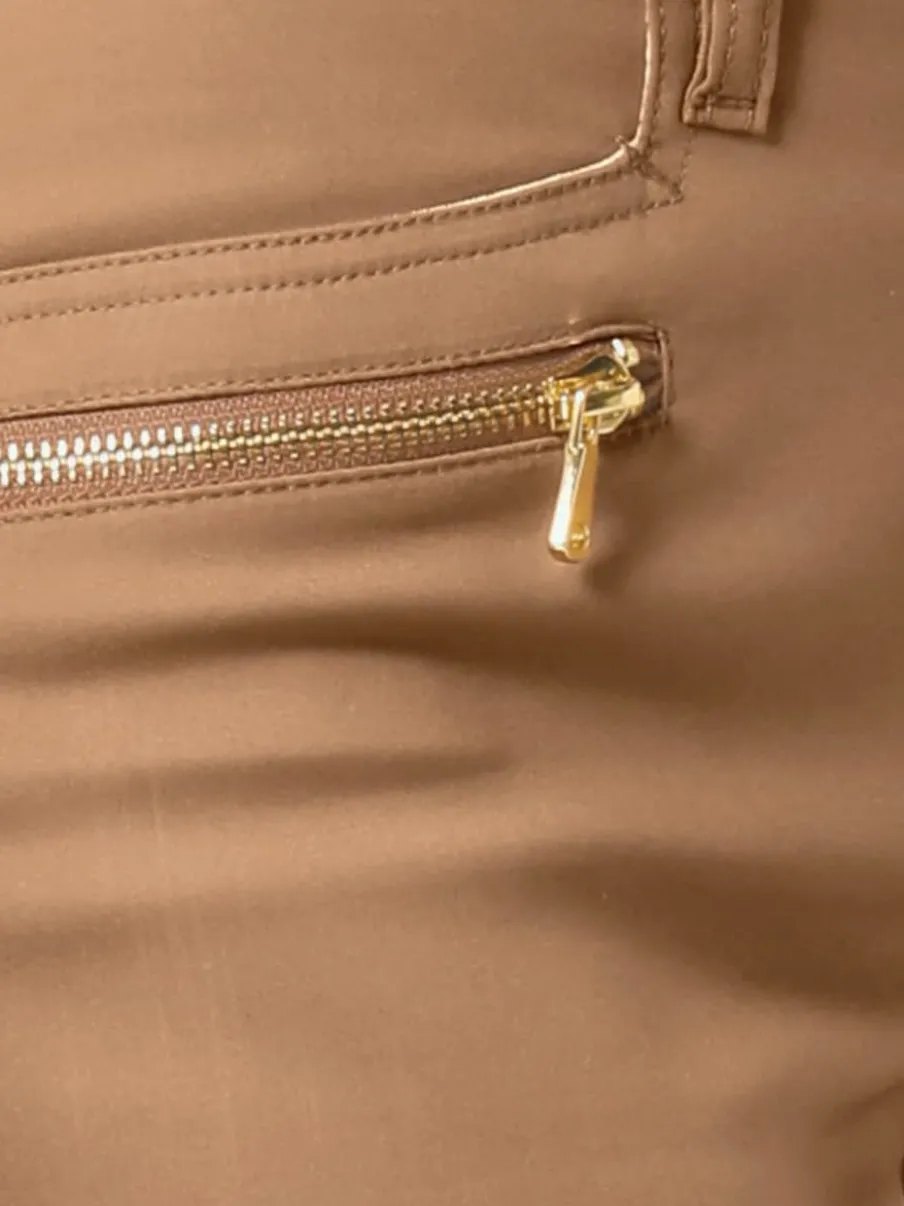 Pantalons extensibles avec coutures push-up et poches intégrées