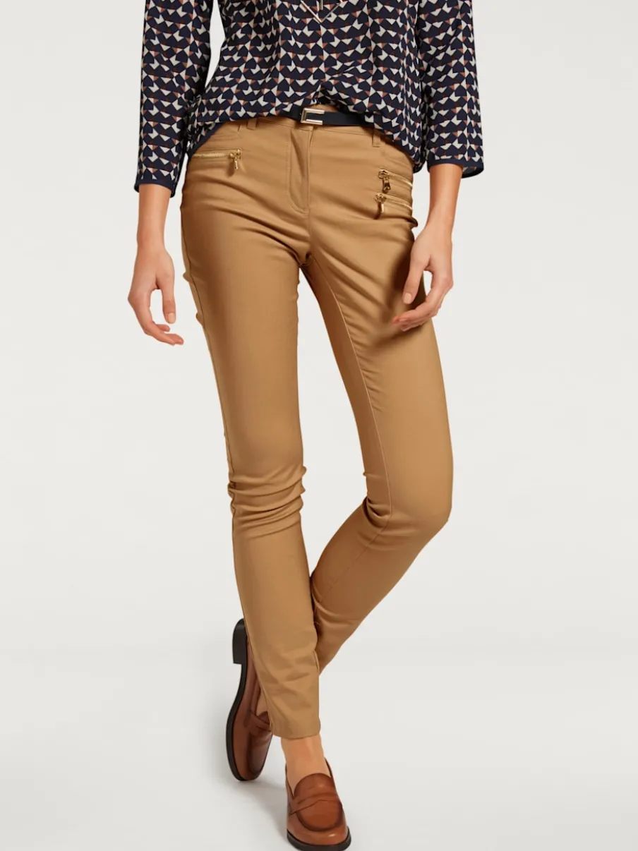 Pantalons extensibles avec coutures push-up et poches intégrées