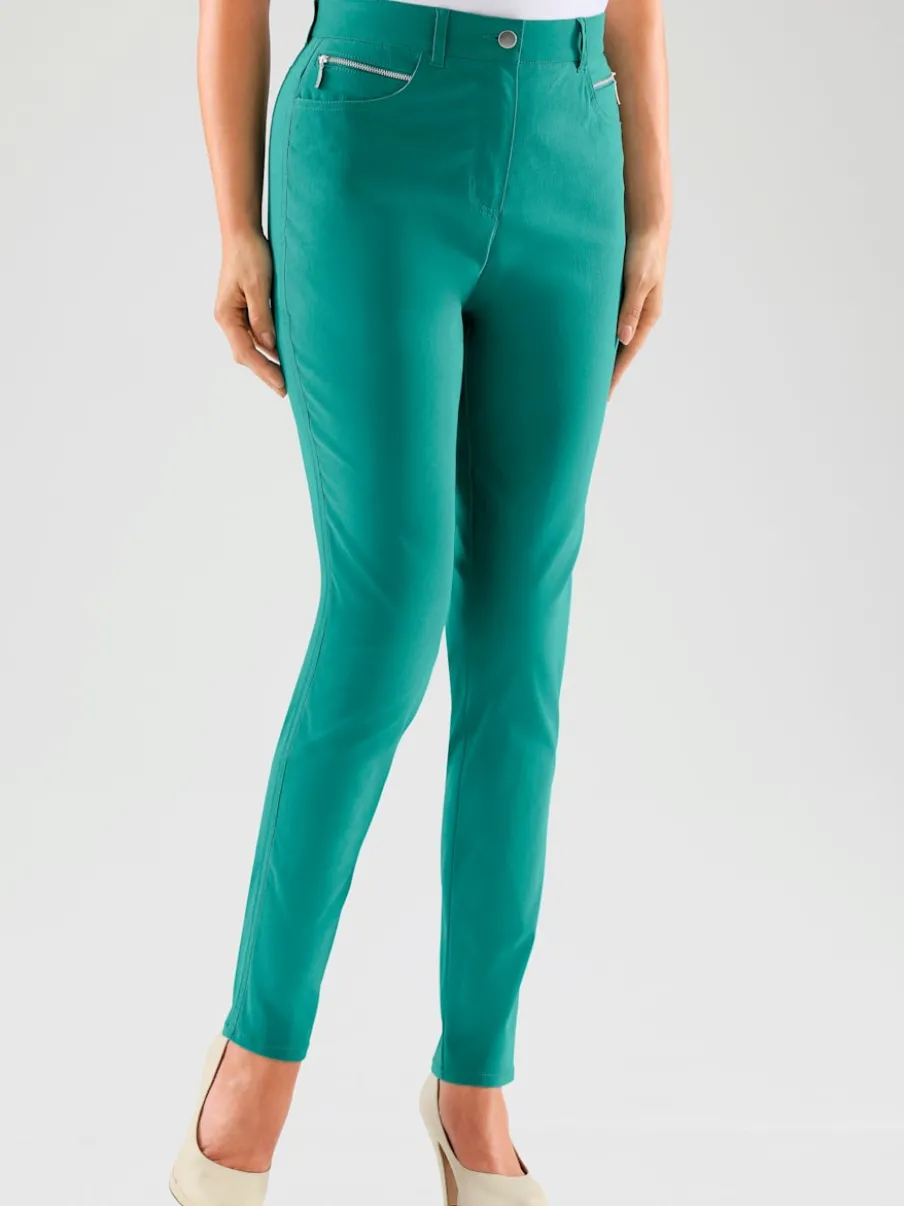 Pantalons extensibles avec poches zippées et passants