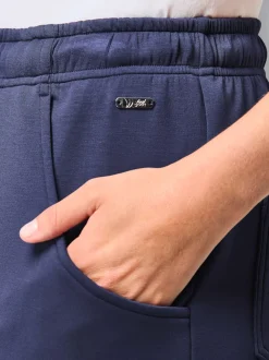 Pantalons fluides avec ceinture et poches pratiques