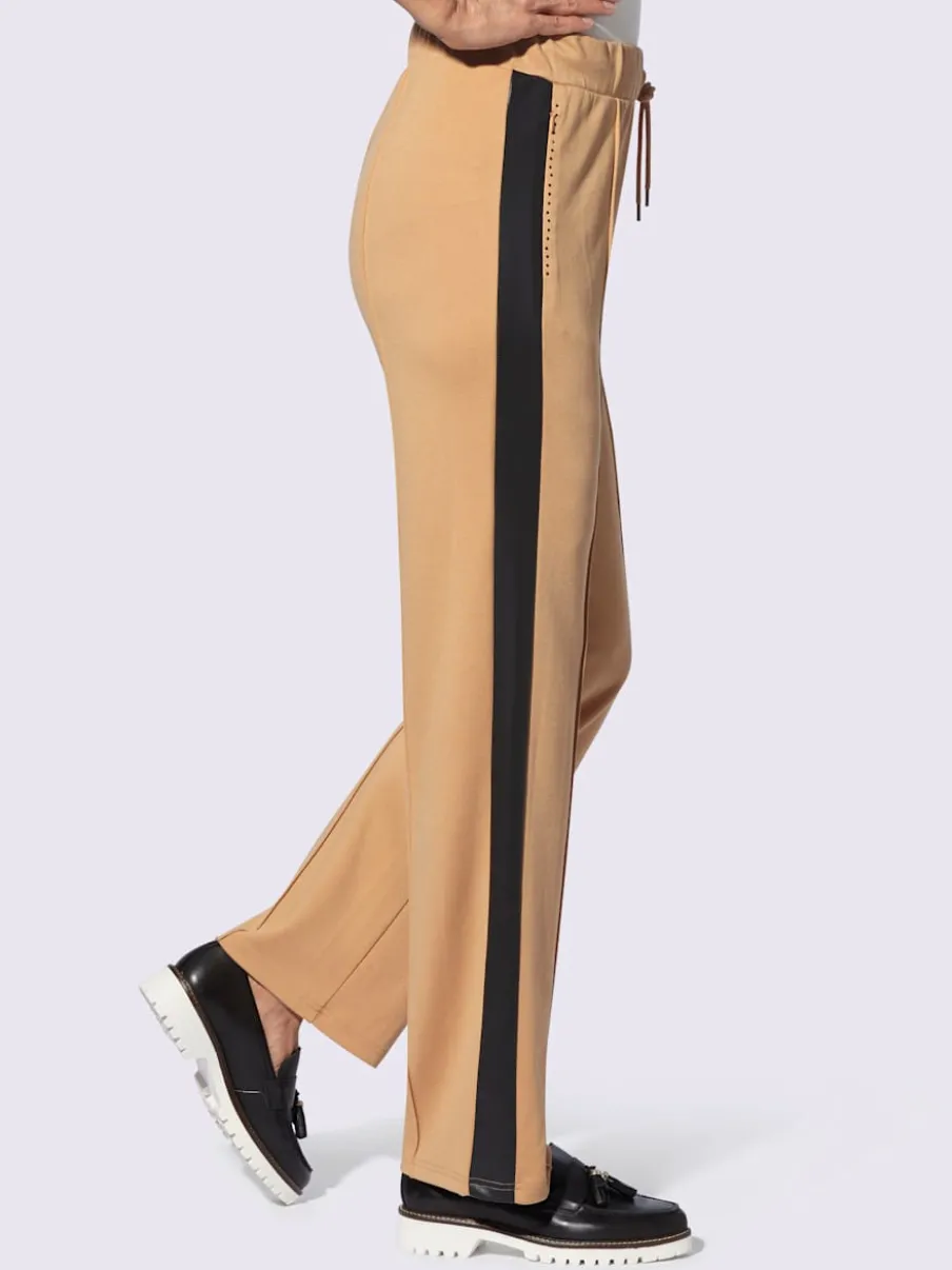 Pantalons fluides avec ceinture élastique et poches zippées