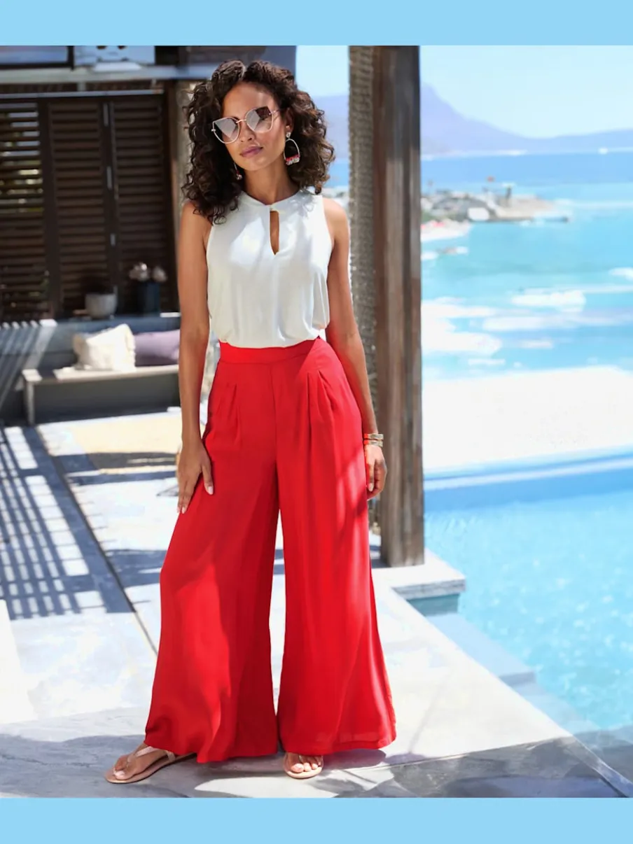 Pantalons fluides à poches latérales et taille élastiquée
