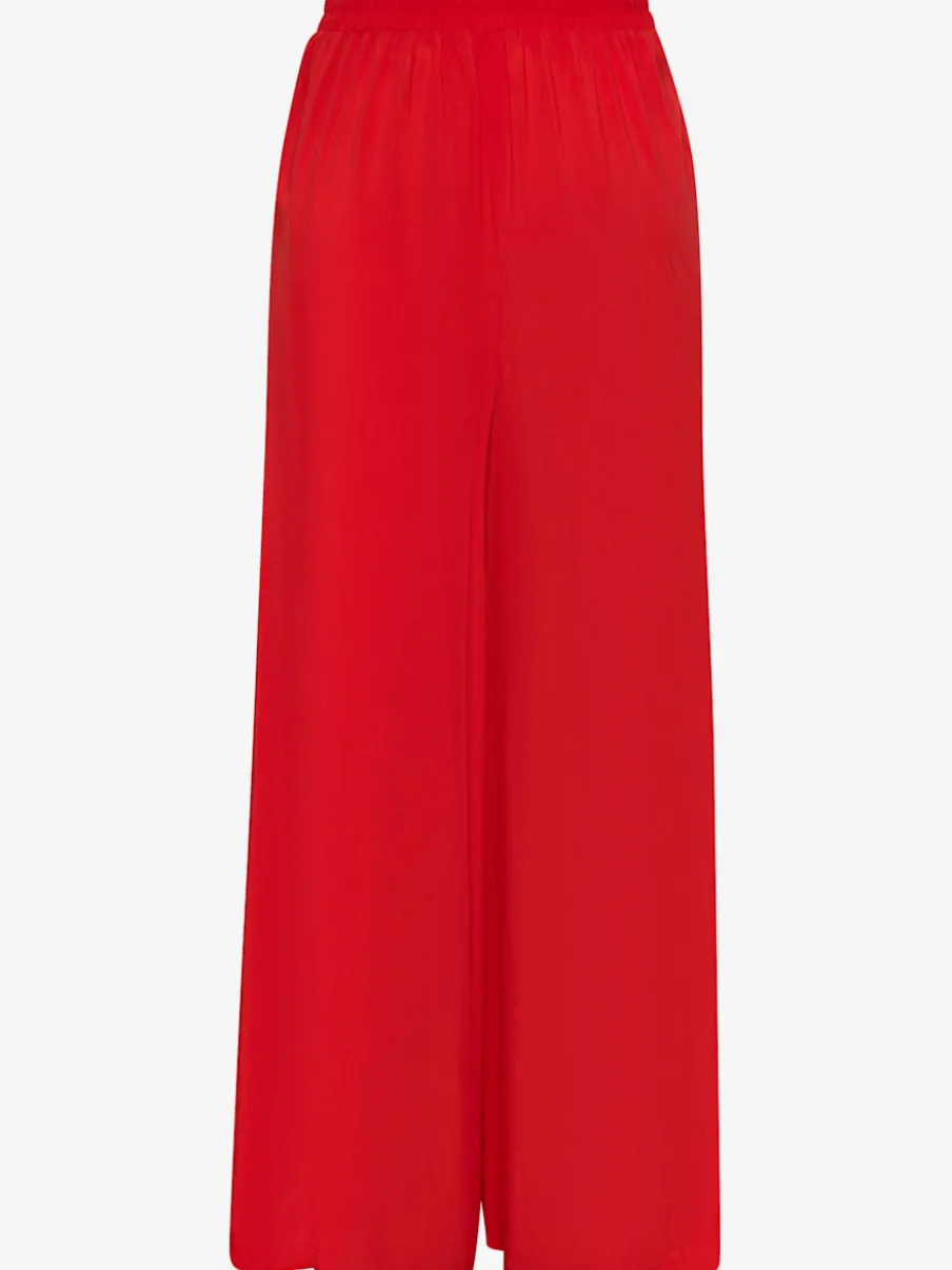Pantalons fluides à poches latérales et taille élastiquée