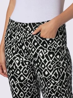 Pantalons imprimés en coton avec fausses poches arrière
