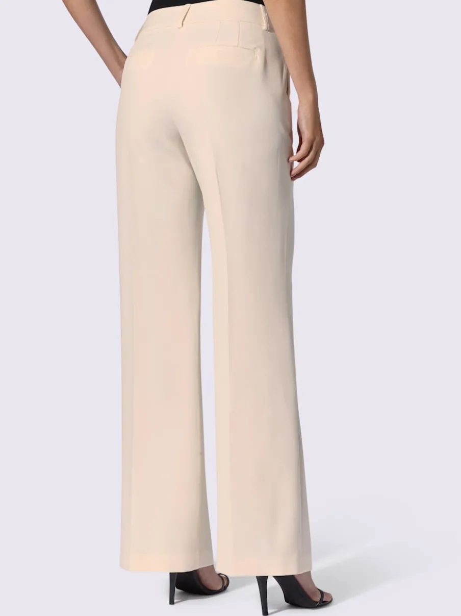 Pantalons à jambes larges avec plis et poches décoratives