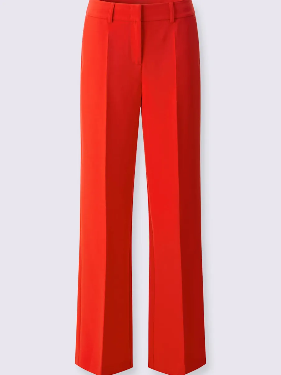 Pantalons à jambes larges avec plis et poches décoratives