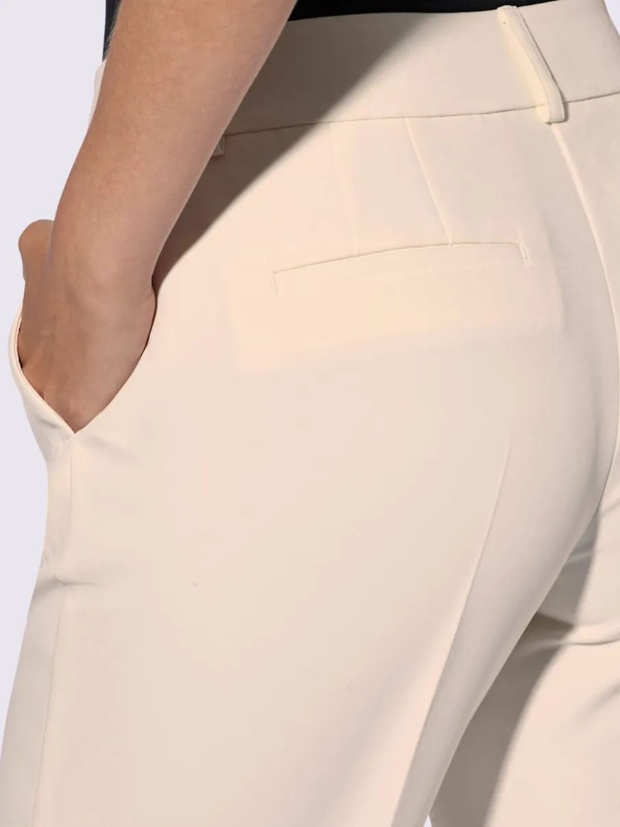 Pantalons à jambes larges avec plis et poches décoratives