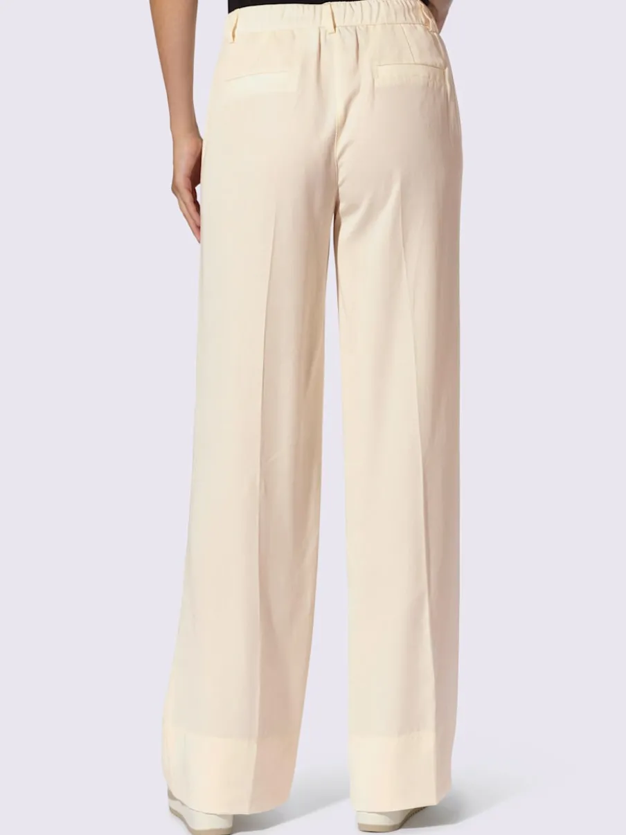 Pantalons larges avec poches latérales et nervures affinantes
