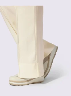 Pantalons larges avec poches latérales et nervures affinantes