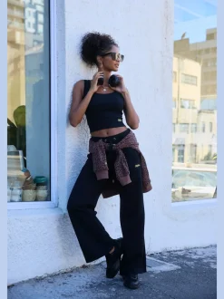 Pantalons moulants avec poches élastiques et empiècements côtelés